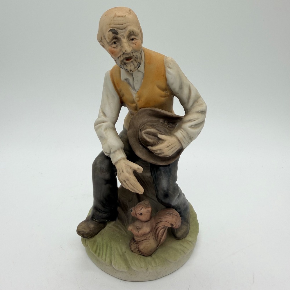 Vintage Porcelain Peasant Man Figurine 6 1/2" Sitting on Stump w/ Squirrel